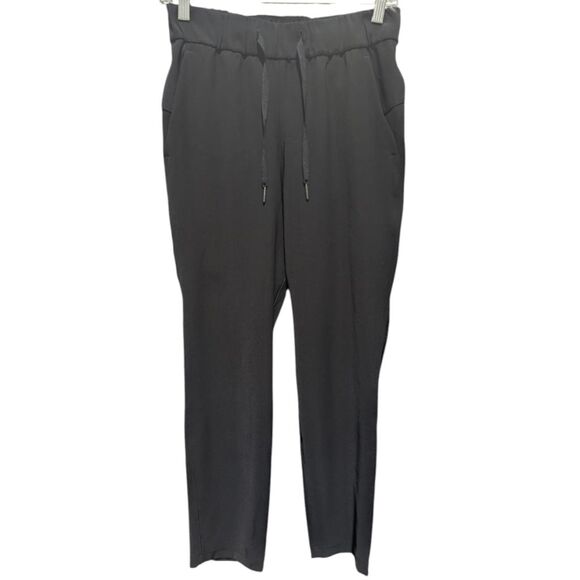 LULULEMON ATHLETICA On The Fly Pant 27' (Woven) Size 4 - Picture 3 of 4
